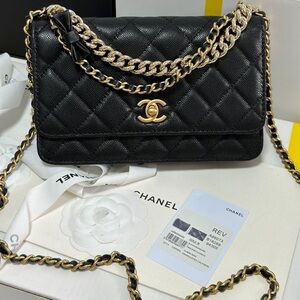 Chanel Black Quilted Bag with Gold Chain Accent